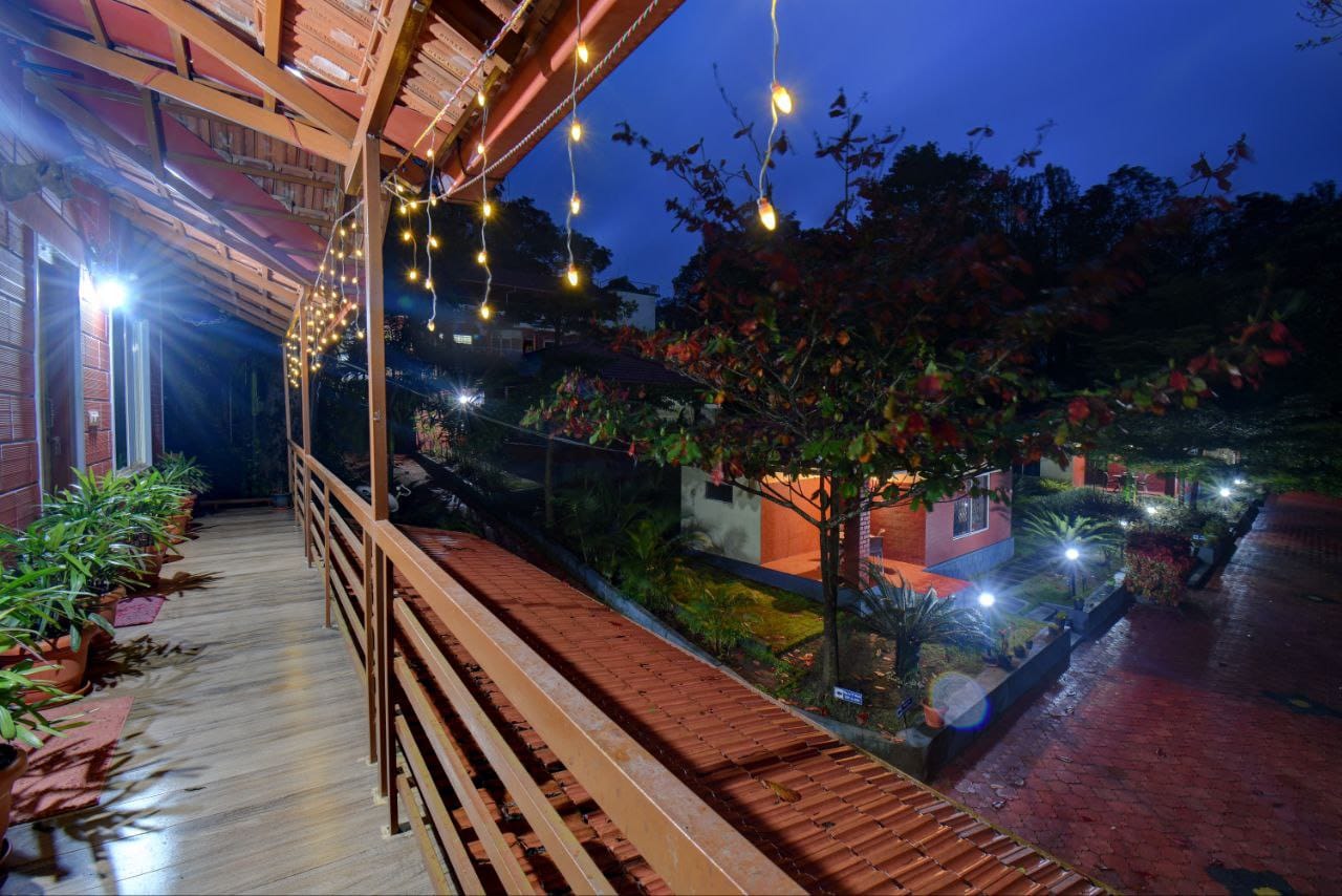 Warm fairy light string glow decorating upper deck balconies at dusk